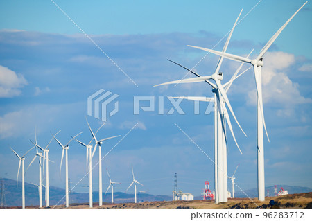 Wind turbines lined up on the coast 96283712
