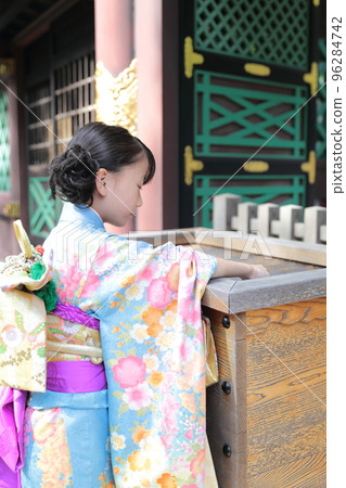 A 7-year-old girl visiting a shrine with Shichigosan A 7-year-old girl visiting a shrine with Shichigosan 96284742