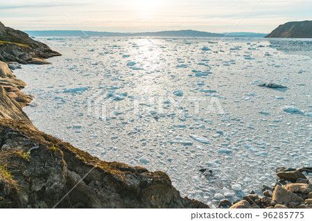 Greenland arctic frozen ice sea landscape background. Climate change melting icebergs and glacier winter scenery 96285775