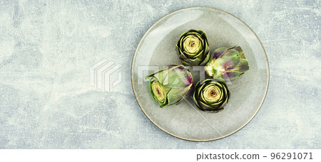 Artichoke - a specific delicacy vegetable. Artichoke - a specific delicacy vegetable. 96291071
