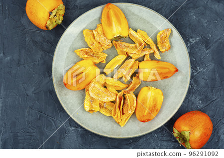 Dried persimmon fruits. 96291092