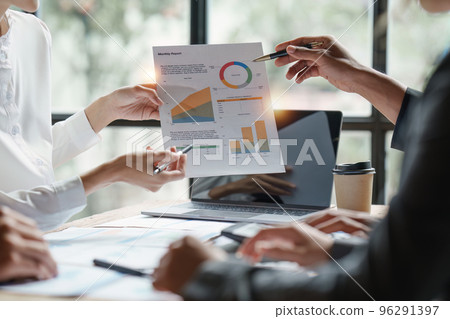 Group of Business people meeting for analysis data figures to plan business strategies. Business discussing, finance concept Group of Business people meeting for analysis data figures to plan business strategies. Business discussing, finance concept 96291397