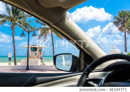 Seafront beach promenade with palm trees on background on sunny day in Fort Lauderdale in Florida USA, view from a car 96294771