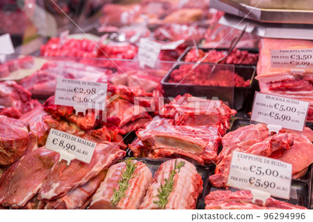 Meat department shelves with typical Italian raw meat inside grocery market in Italy 96294996