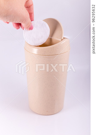 Plastic beige trash bin isolated on white background 96295632
