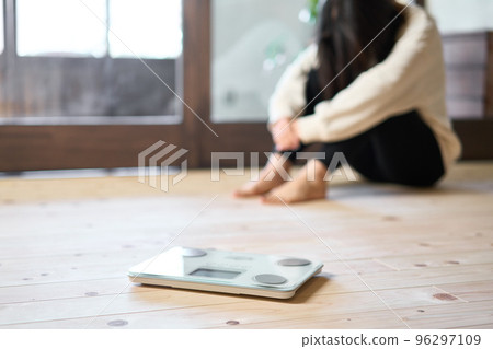 Asian woman frustrated by diet 96297109