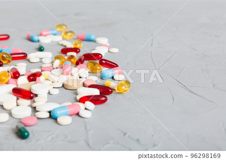 Collection Of Various Medical Tablets And Pills. Assorted pharmaceutical medicine pills, tablets and capsules on table background. Heap of assorted various medicine tablets. Health care 96298169