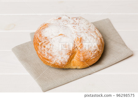 Fresh homemade crisp bread on napkin, top view. Healthy unleavened bread. French bread. Top view Bakery products Fresh homemade crisp bread on napkin, top view. Healthy unleavened bread. French bread. Top view Bakery products 96298575