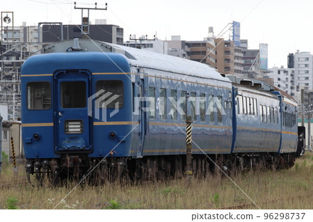 A blue train passenger car parked in the Oku passenger car yard (2022) A blue train passenger car parked in the Oku passenger car yard (2022) 96298737