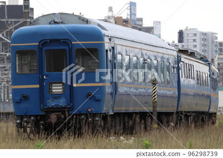A blue train passenger car parked in the Oku passenger car yard (2022) A blue train passenger car parked in the Oku passenger car yard (2022) 96298739