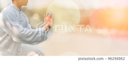 Asian man workout with Tai Chi in the morning at the park, Chinese martial arts, healthy care for healthy life concept. 96298862