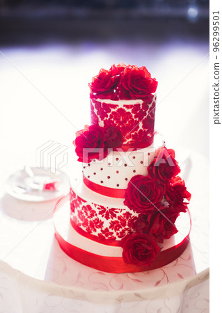 Luxury decorated wedding cake on the table Luxury decorated wedding cake on the table 96299501