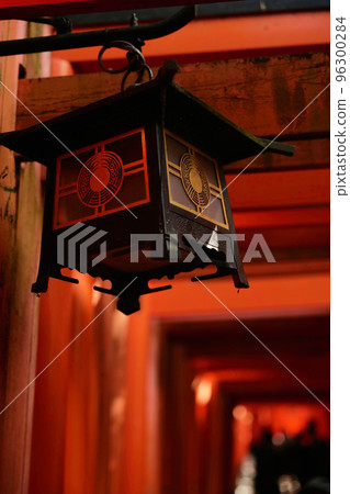 Fushimi Inari's 1,000 torii gates and hanging lanterns Fushimi Inari's 1,000 torii gates and hanging lanterns 96300284
