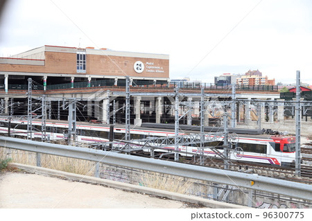 Train. Train tracks. Train entering a station. Subway leaving the station. Means of transport in Madrid, in Spain. Horizontal photography. Train. Train tracks. Train entering a station. Subway leaving the station. Means of transport in Madrid, in Spain. Horizontal photography. 96300775