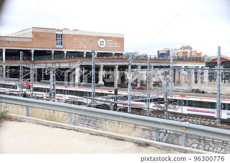 Train. Train tracks. Train entering a station. Subway leaving the station. Means of transport in Madrid, in Spain. Horizontal photography. Train. Train tracks. Train entering a station. Subway leaving the station. Means of transport in Madrid, in Spain. Horizontal photography. 96300776