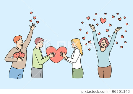 Young men, women hold big heart, give, spread love. 96301343