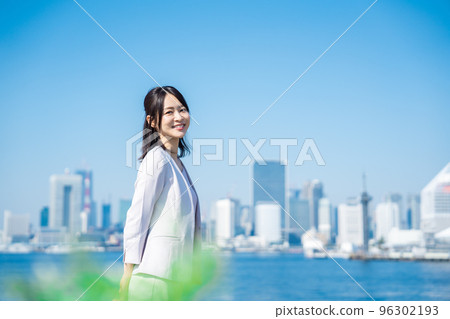 Businesswoman walking outside Businesswoman walking outside 96302193