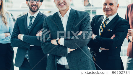 group of experienced employees standing in the office. group of experienced employees standing in the office. 96302784
