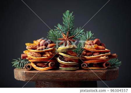 Christmas still-life with dried fruits and nuts. 96304557