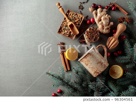 Mug and ingredients for making a winter hot drink. 96304561