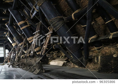 Attic in palm-stone building 96305866