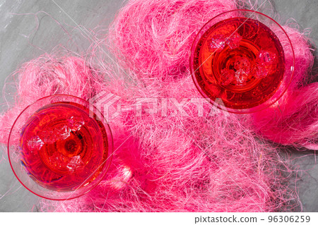 Cold pink cocktail on concrete background close up 96306259