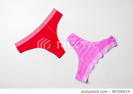 Set of cotton string women's panties on white background 96306624
