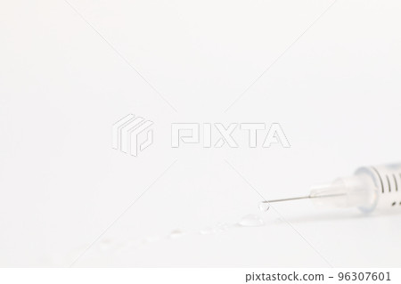 Syringe vaccine isolated in white background Syringe vaccine isolated in white background 96307601