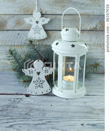Christmas, white lantern with a burning candle, toy angels, on a wooden background, Christmas decorations, winter, Happy New Year Christmas, white lantern with a burning candle, toy angels, on a wooden background, Christmas decorations, winter, Happy New Year 96307656
