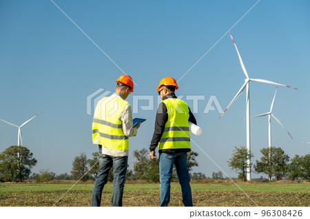 Windmills maintained by professional engineers at rural site 96308426