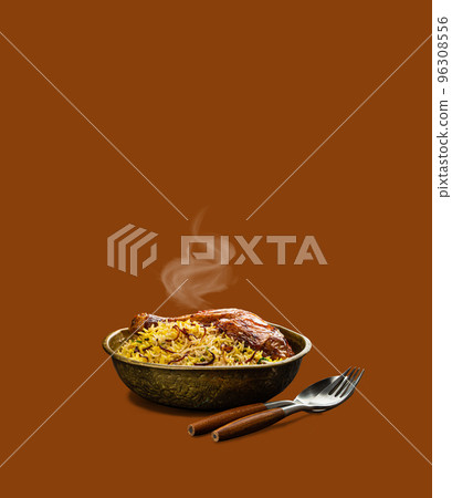 Indian dish Biryani chicken with basmati rice with steam isolated Indian dish Biryani chicken with basmati rice with steam isolated 96308556