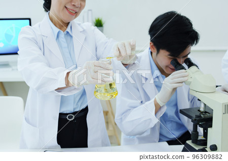 medical research laboratories, scientists analyze chemical samples Discuss technological innovations. Advanced scientific laboratories for medicine, biotechnology medical research laboratories, scientists analyze chemical samples Discuss technological innovations. Advanced scientific laboratories for medicine, biotechnology 96309882