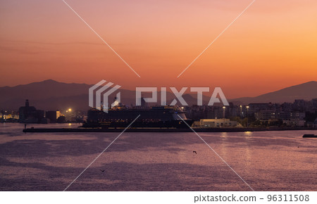Cruise Ship in Port in Capital City of Athens, Greece. Colorful Sunrise Sky Cruise Ship in Port in Capital City of Athens, Greece. Colorful Sunrise Sky 96311508