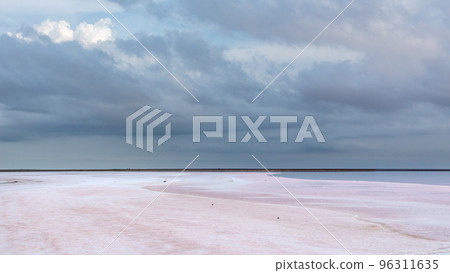 Salt pink lake gray purple high epic clouds on sky Salt pink lake gray purple high epic clouds on sky 96311635