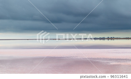 Salt pink lake reflective mirror with epic clouds Salt pink lake reflective mirror with epic clouds 96311641