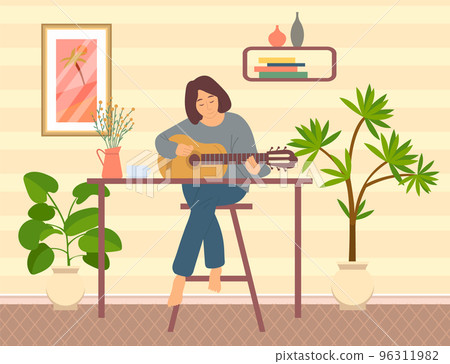 Lady sits in apartment and plays musical instrument. Woman playing acoustic guitar at home Lady sits in apartment and plays musical instrument. Woman playing acoustic guitar at home 96311982