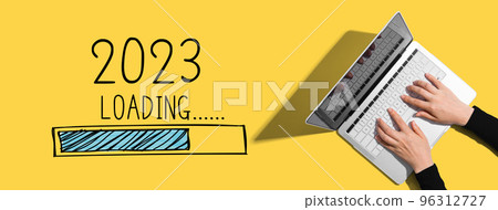 Loading new year 2023 with person using laptop Loading new year 2023 with person using laptop 96312727