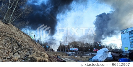 war in Ukraine. Horrors of war in Ukraine. Black smoke against sky 96312907