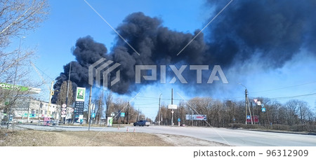 war in Ukraine. Horrors of war in Ukraine. Black smoke against sky 96312909