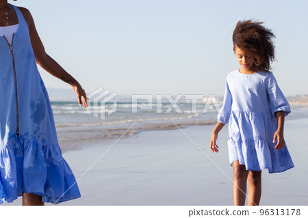 Relaxed mother and daughter on vacation Relaxed mother and daughter on vacation 96313178