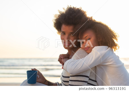 Portrait of content family at sunset 96313191