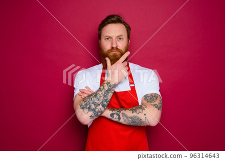 doubter isolated chef with beard and red apron doubter isolated chef with beard and red apron 96314643