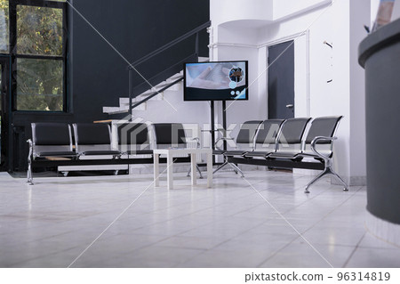 interior of empty hospital lobby with big windows waiting for patients. Modern healthcare facility, professional treatment room. Waiting area of emergency hospital reception interior of empty hospital lobby with big windows waiting for patients. Modern healthcare facility, professional treatment room. Waiting area of emergency hospital reception 96314819