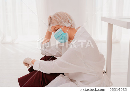 doctor is tired and stressed due to covid-19 virus pandemic doctor is tired and stressed due to covid-19 virus pandemic 96314983
