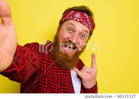 Happy man with beard and bandana in head 96315317