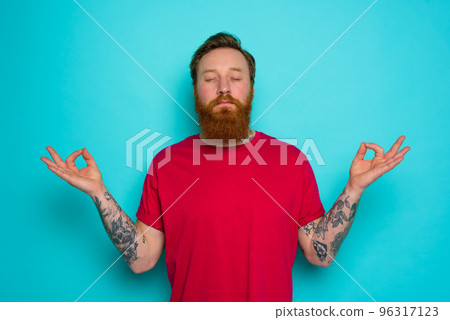 Man is total relax in yoga position 96317123