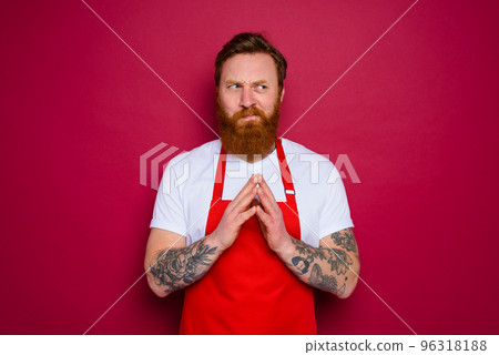 doubter isolated chef with beard and red apron 96318188