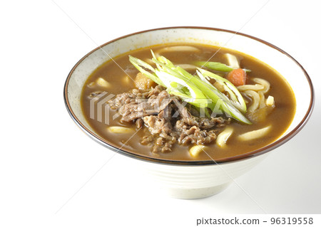 Curry udon noodles with green onions and beef shot against a white background 96319558