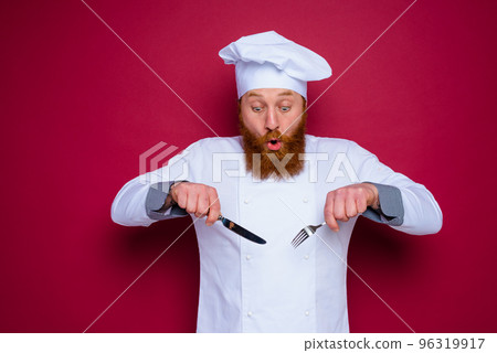 amazed chef with beard and red apron is ready to cook 96319917