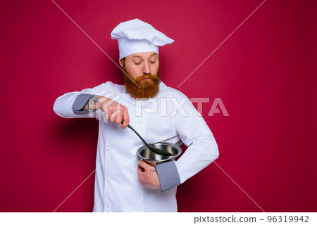 doubter chef with beard and red apron is ready to cook 96319942